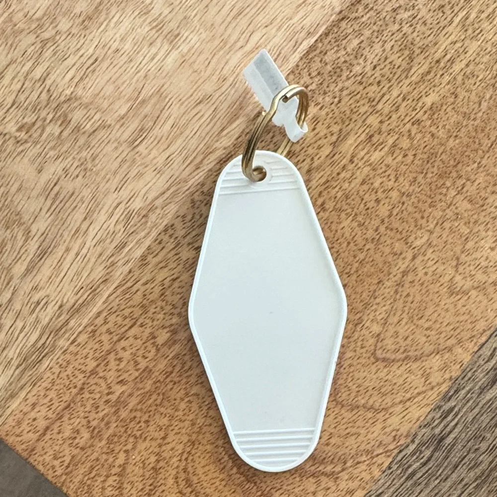 White Keychain with Fun Quote